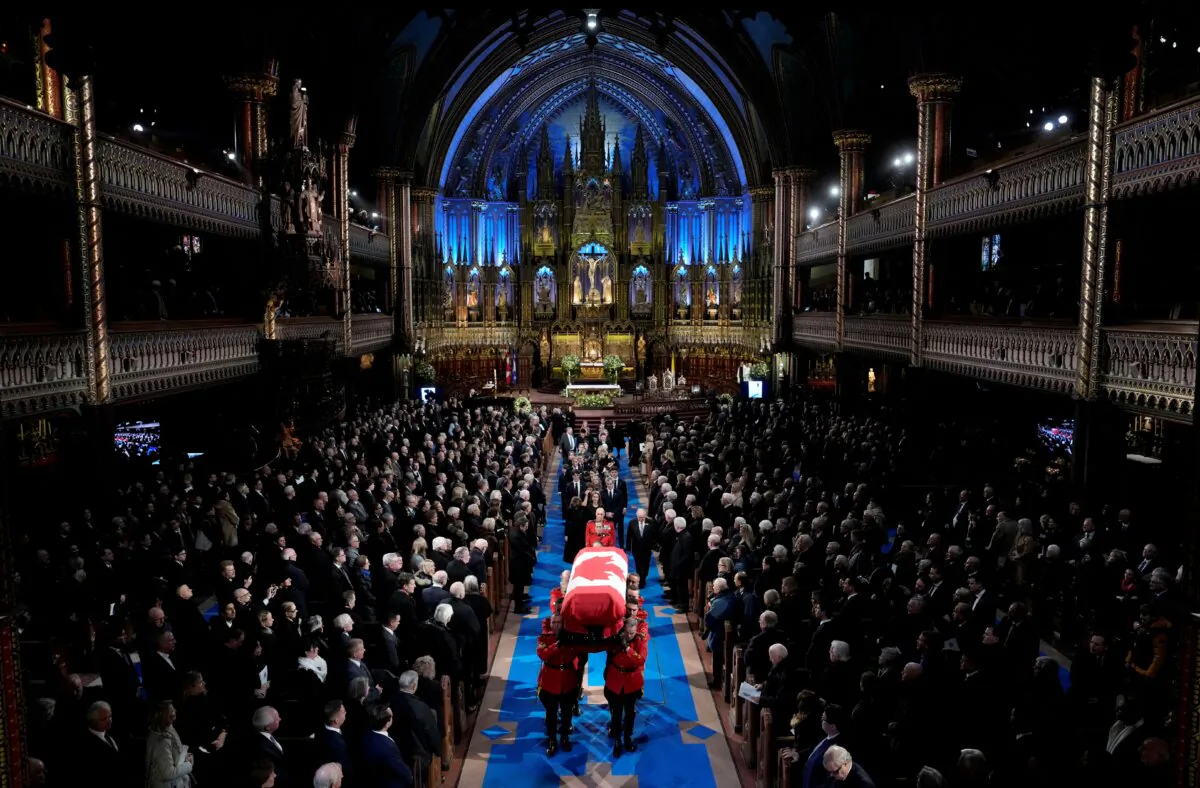 The casket is carried out at the end of the state funeral of former prime minister Brian Mulroney, in Montreal on March 23, 2024. (The Canadian Press/Adrian Wyld)