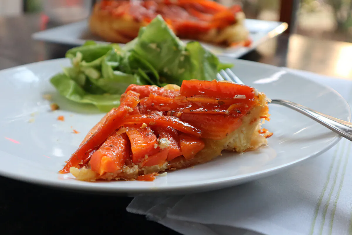 A savory carrot tarte tatin is paired with a green salad for a simple, and elegant, vegetarian supper. (Gretchen McKay/Pittsburgh Post-Gazette/TNS)