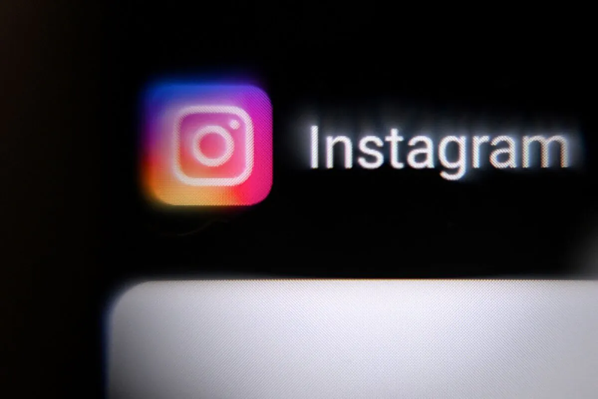 The social network Instagram logo on a smartphone screen on March 14, 2022. (AFP via Getty Images)