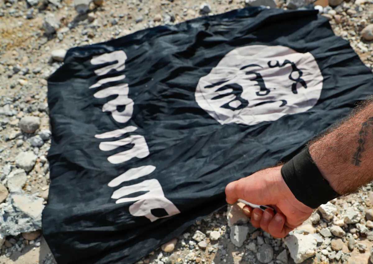 A file photo shows the ISIS terrorist group's flap. (Hussein Malla/AP Photo)