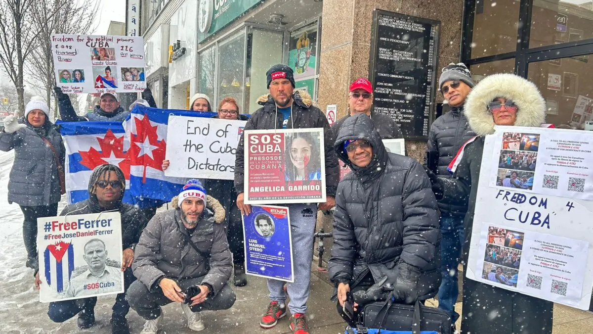 A group of Cuban-Canadians gathered in front of Deputy Prime Minister Chrystia Freeland's office building in downtown Toronto on March 22, 2024. (Liza Domenech)