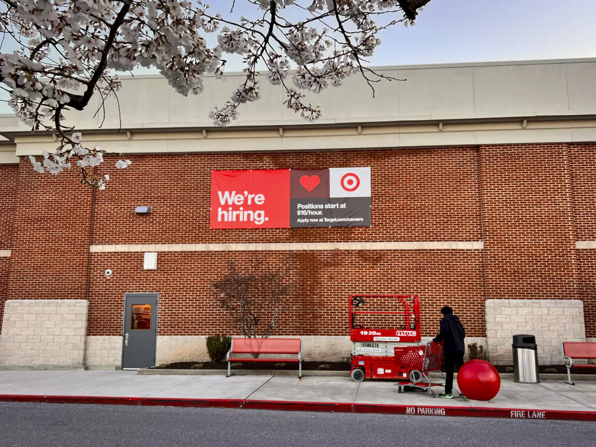 A "We're Hiring" sign at a grocery store in Ellicott City, Md., on March 24, 2024. (Madalina Vasiliu/The Epoch Times)
