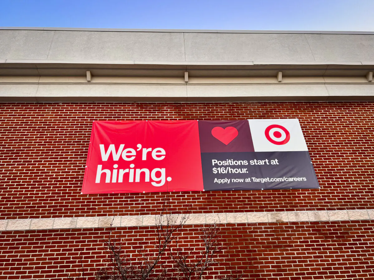 A hiring sign at a grocery store in Ellicott City, Md., on March 24, 2024. (Madalina Vasiliu/The Epoch Times)