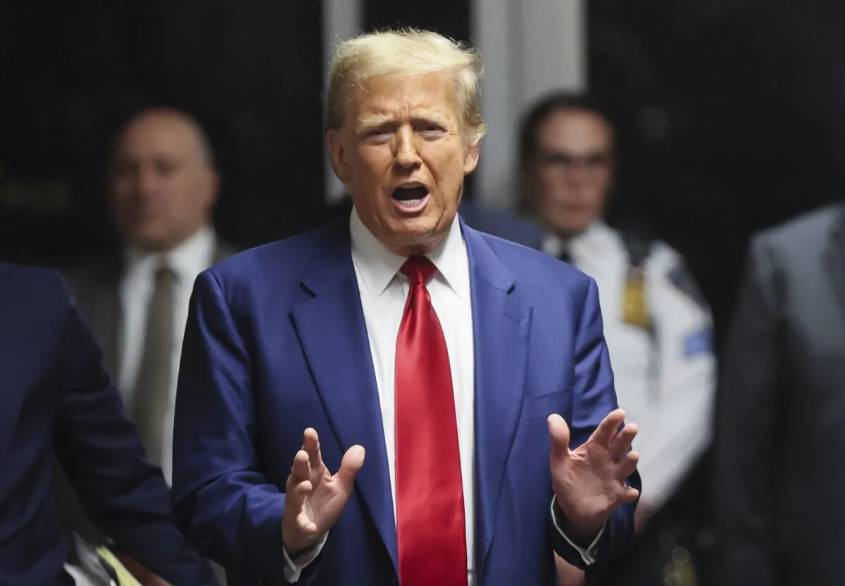 Former President Donald Trump speaks to the media during a break in a pretrial hearing at a criminal court in New York on March 25, 2024. (Brendan McDermid-Pool/Getty Images)