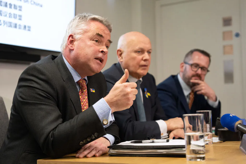 (L-R) British Parliamentarians Tim Loughton, Iain Duncan Smith, and Stewart McDonald hold a press conference following allegations that China is responsible for cyberattacks on the UK Electoral Commission in London on March 25, 2024. Allegations have been made that China accessed the personal details of 40 million British voters after a cyberattack on the Electoral Commission as well as 43 UK MP and Peers. (Carl Court/Getty Images)