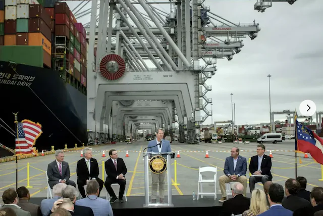 Georgia Gov. Brian Kemp, center, speaks during a visit to the Port of Savannah with U.S. Reps. Sam Graves (R-Mo.), center left, Buddy Carter (R-Ga.), left, and Mike Collins, (R-Ga.,) center left, at the Georgia Port Authority's Garden City Terminal, March, 25, 2024, in Savannah, Ga. (Georgia Port Authority via AP)