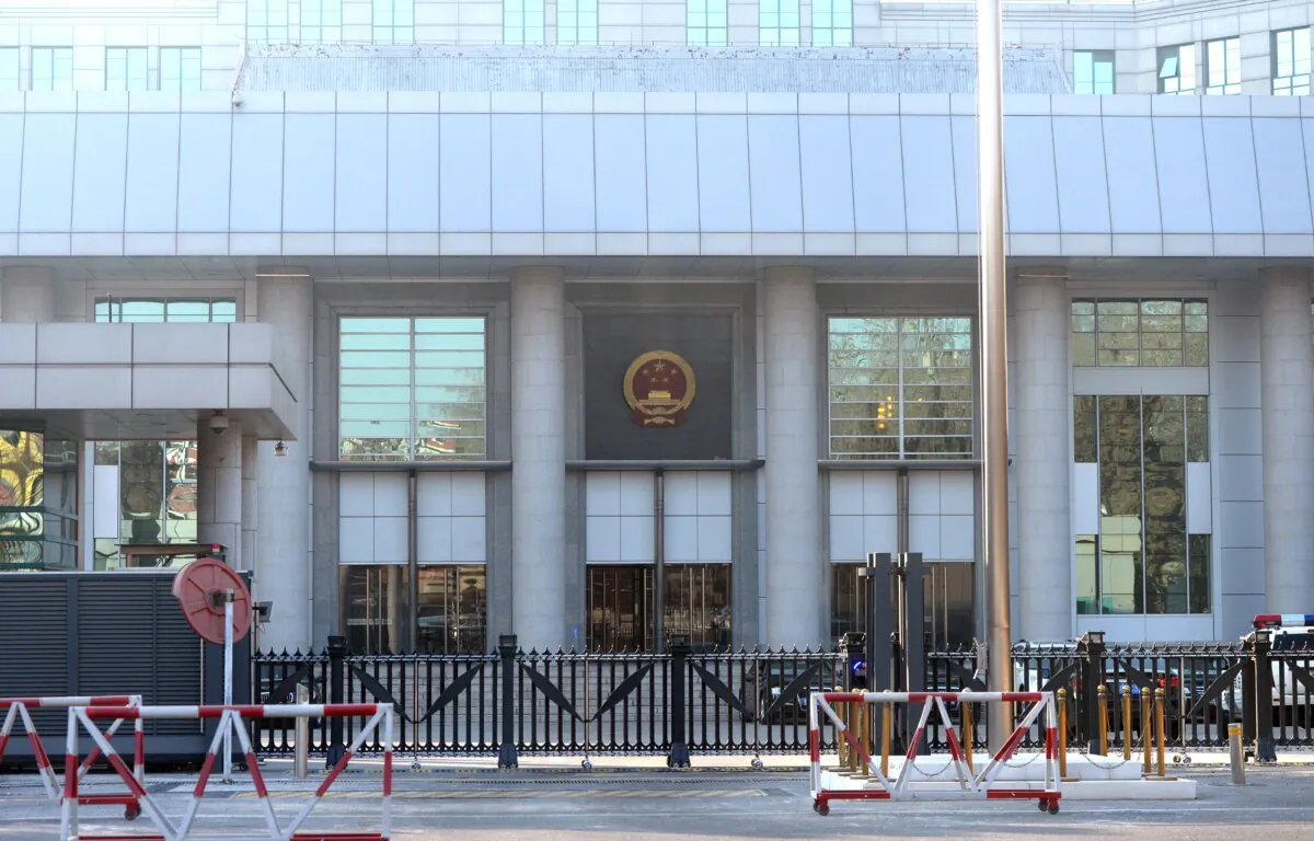 Barricades are set up outside the No. 1 Intermediate court in Beijing on Jan. 22, 2014. (Goh Chai Hin/AFP via Getty Images)