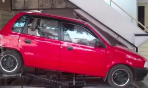 Man Builds Unique Parking Garage Under Stairs