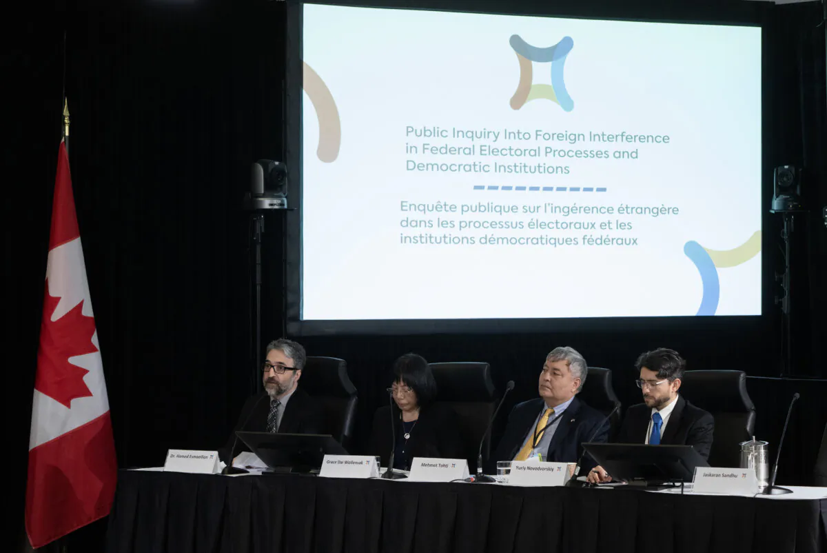 (L-R) Diaspora members Hamed Esmaeilion, Grace Wollensak, Mehmet Tohti, and Yuriy Novodvorskiy appear at the Public Inquiry Into Foreign Interference in Federal Electoral Processes and Democratic Institutions, in Ottawa on March 27, 2024. (Adrian Wyld/The Canadian Press)