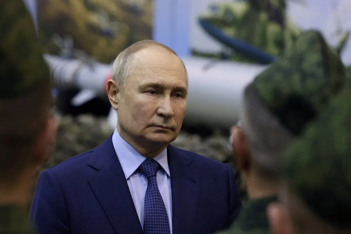 Russian President Vladimir Putin talks to military pilots at the 344th State Centre for combat use and retraining of flight crews of the Russian Defense Ministry in the town of Torzhok in the Tver Region, Russia, on March 27, 2024. (Sputnik/Mikhail Metzel/Pool via Reuters)
