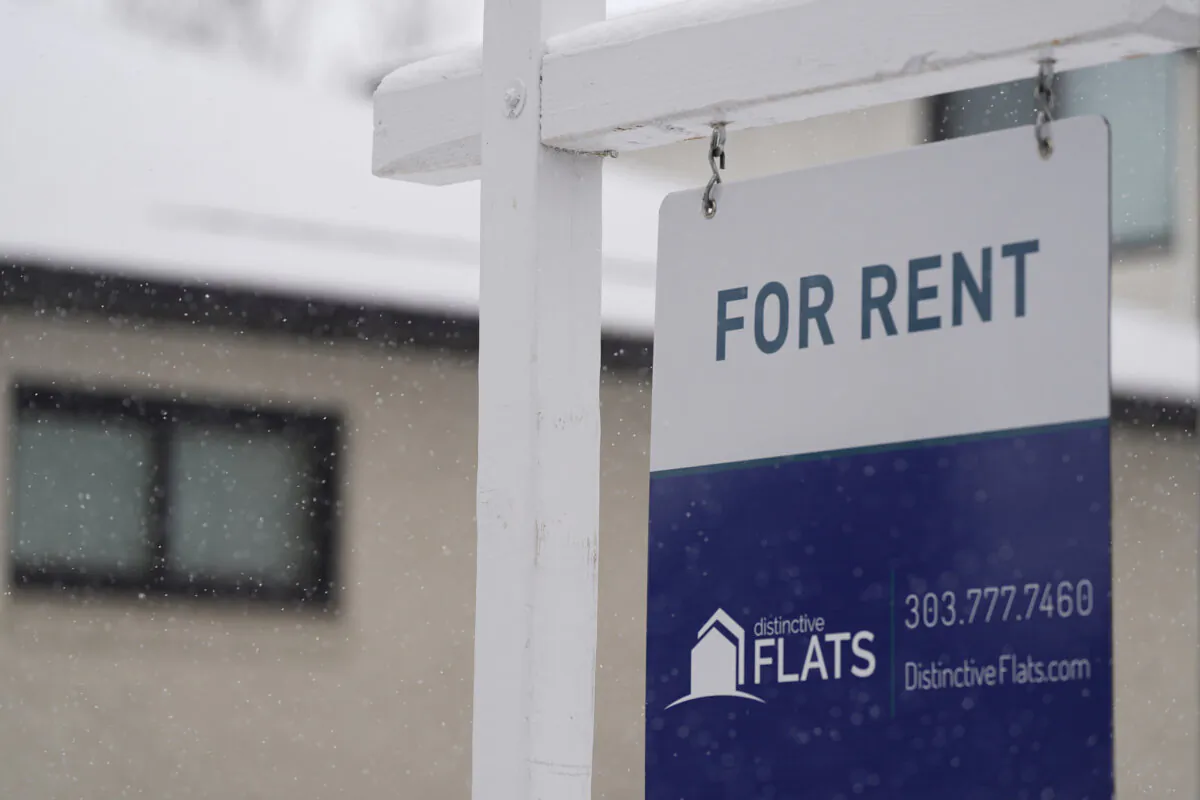 A for rent sign stands outside a single-family home on the market Saturday, Feb. 10, 2024, in Denver. (David Zalubowski/AP)