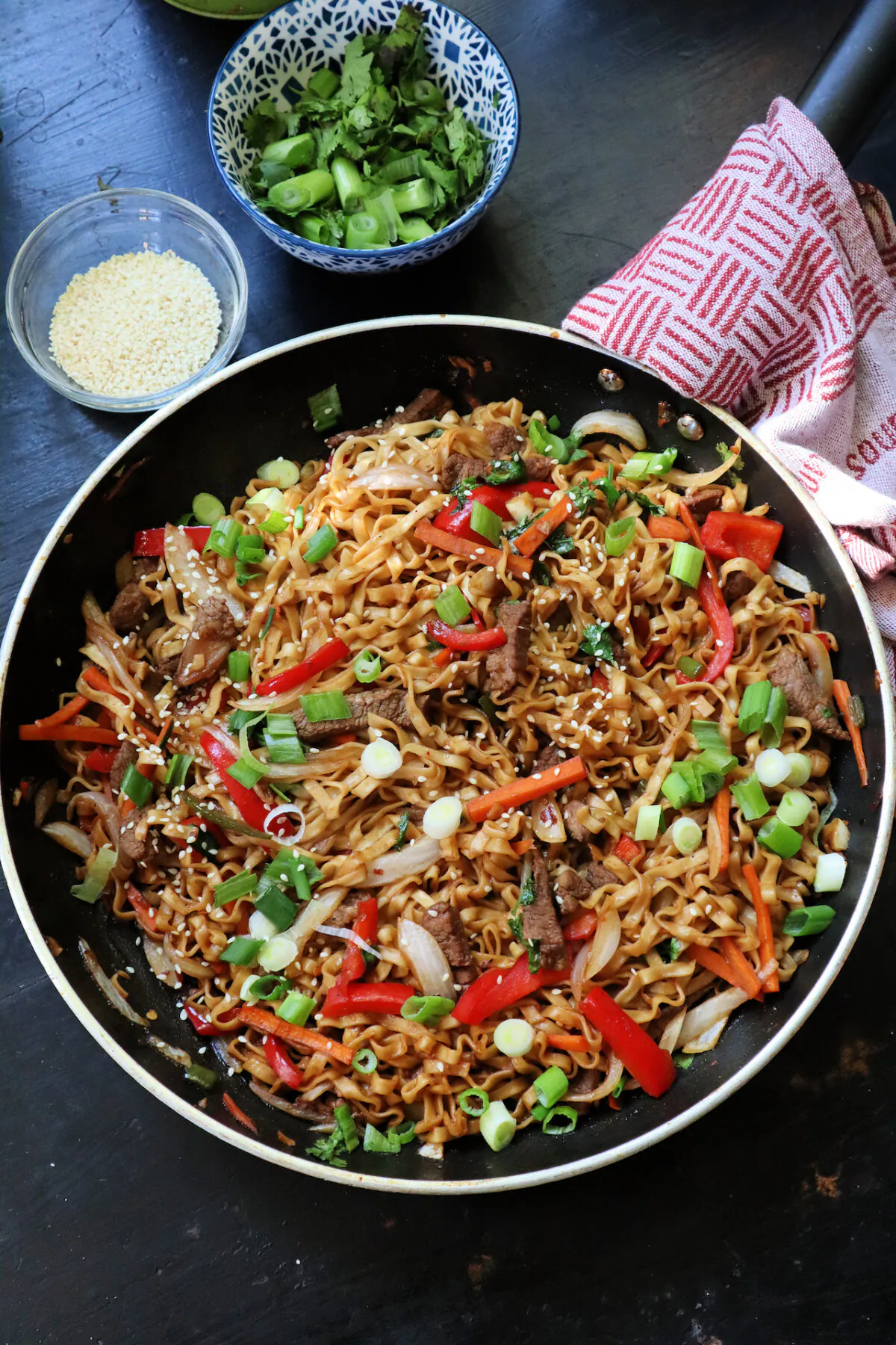 Chinese egg noodles tossed in a spicy sauce with thinly sliced lamb and spring vegetables is a fast and easy weeknight meal that's also perfect for Ramadan. (Gretchen McKay/Pittsburgh Post-Gazette/TNS)