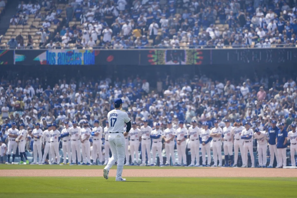 Los Angeles Dodgers' Shohei Ohtani (17) walks on the field during pre-game introductions before the team's baseball game against the St. Louis Cardinals in Los Angeles on March 28, 2024. (Jae C. Hong/AP Photo)