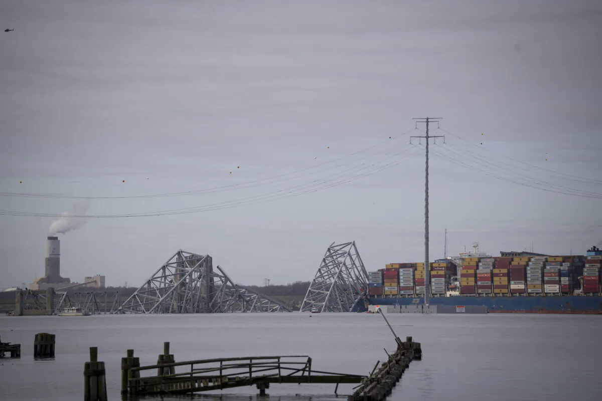 The Francis Scott Key Bridge after being knocked down by the 95,000-ton Dali in Baltimore Harbor on March 26, 2024. (Madalina Vasiliu/The Epoch Times)