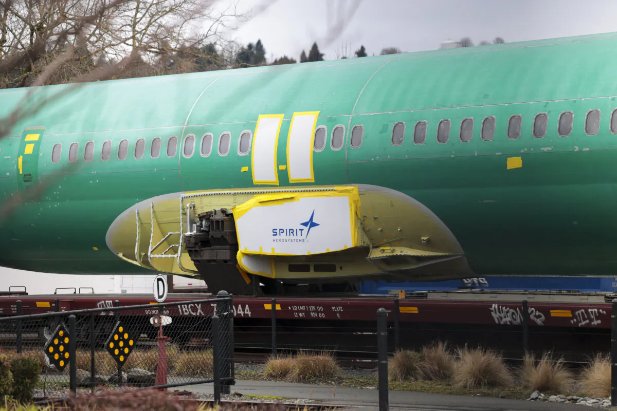 The Spirit AeroSystems logo is pictured on an unpainted 737 fuselage as Boeing's 737 factory teams hold the first day of a "Quality Stand Down" for the 737 program at Boeing's factory in Renton, Washington, on Jan. 25, 2024. (Jason Redmond/AFP via Getty Images)