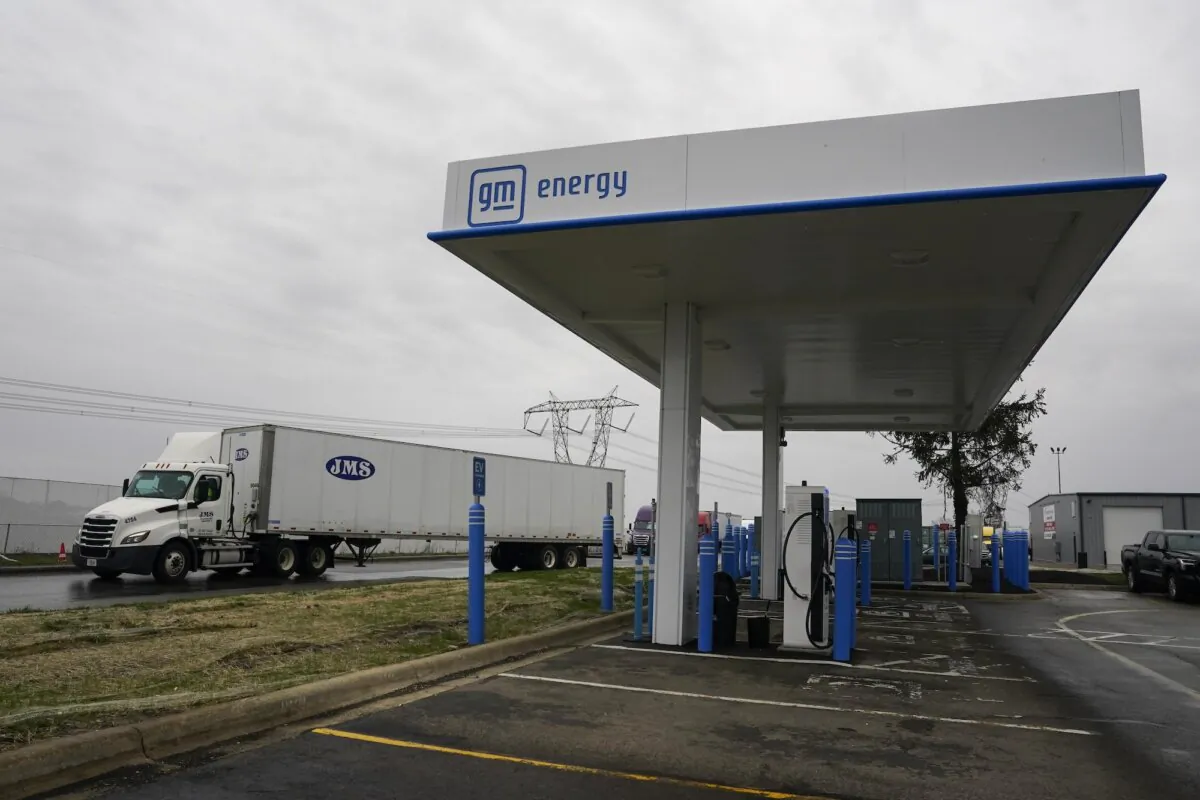A truck drives by an electric vehicle charging station in London, Ohio, on March 8, 2024. (Joshua A. Bickel/AP Photo)