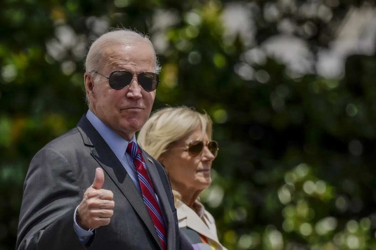 President Joe Biden gives a thumbs up as he walks with First Lady Jill Biden to Marine One on the South Lawn of the White House on July 14, 2023. (Drew Angerer/Getty Images)