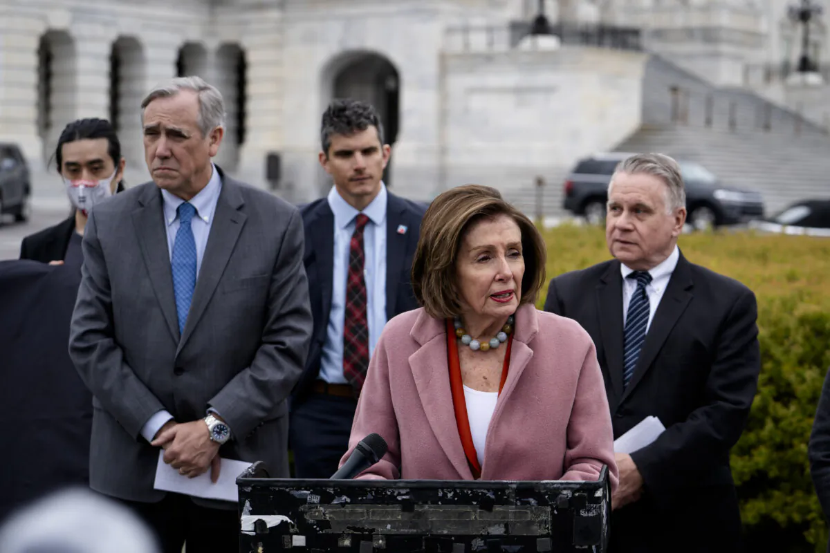 Sen. Jeff Merkley (L), former House Speaker Rep. Nancy Pelosi (2nd R), and Congressional-Executive Commission on China (CECC) chair Rep. Chris Smith (R), at the House Triangle near the U.S. Capitol, on March 22, 2024. (Madalina Vasiliu/The Epoch Times)