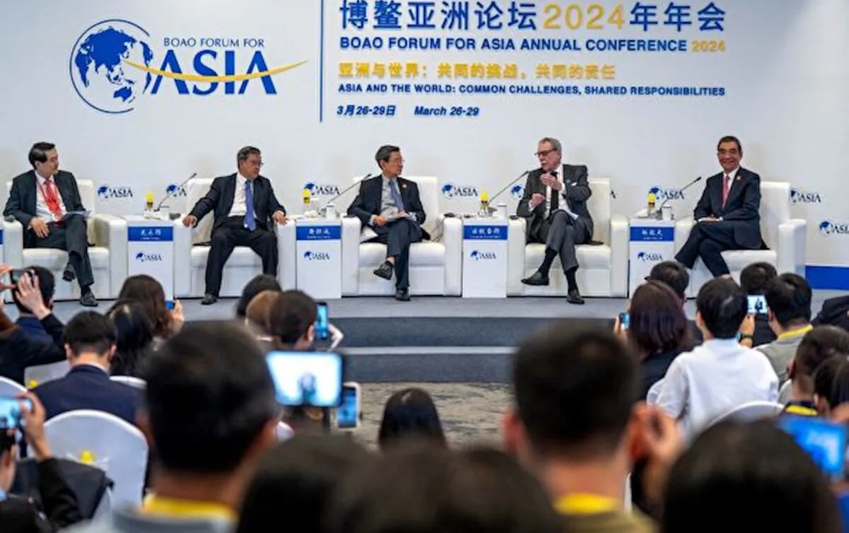Journalists attend an event of the Boao Forum for Asia (BFA) Annual Conference 2024 in Boao, Hainan Province, China, on March 26, 2024. (Photo by AFP) / China OUT