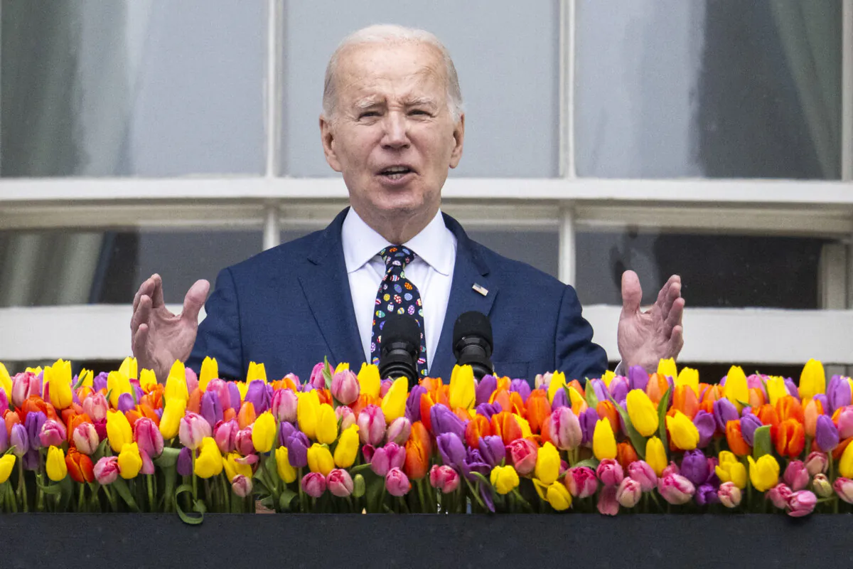 President Joe Biden speaks from the balcony of the White House during the annual Easter Egg Roll on the South Lawn on April 1, 2024. (Jim Watson/AFP via Getty Images)