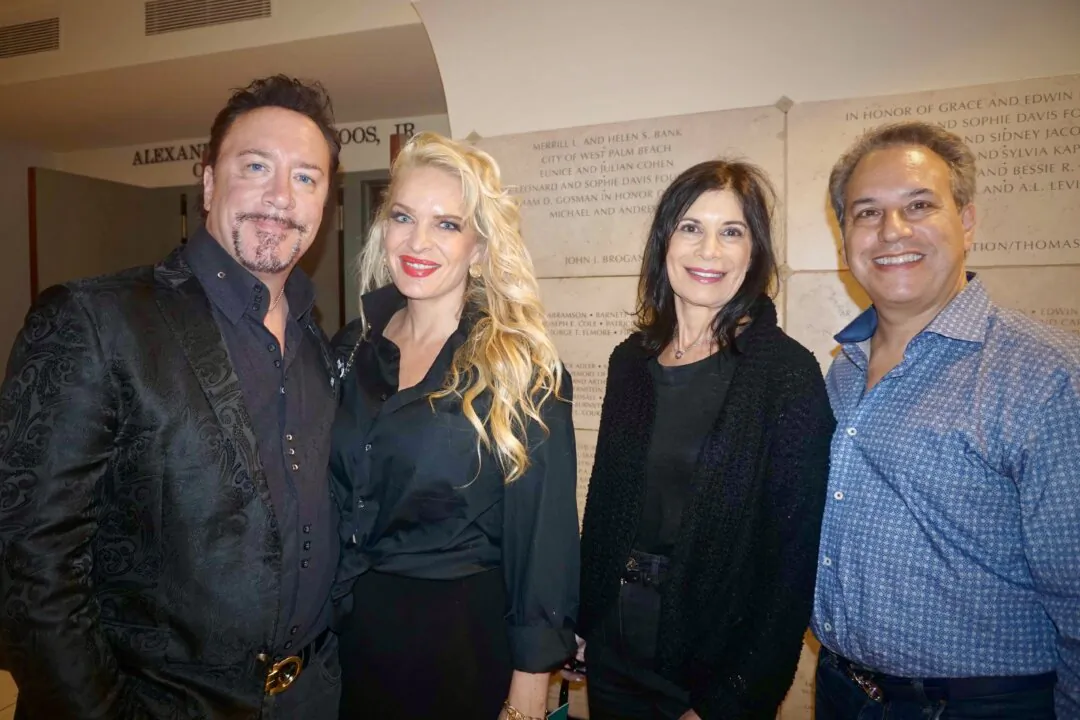 Dug McGuirk,(L) Heidi Rain,(2ndL) and Dr. David Felker (R) enjoyed Shen Yun's evening performance at the Kravis Center for the Performing Arts, in Florida, on April 29, 2024. (Yeawen Hung/The Epoch Times)