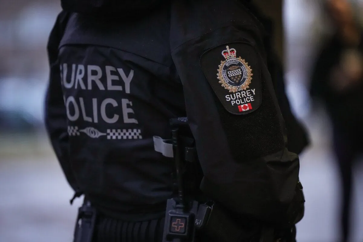 A Surrey police department logo is seen on an officer's jacket in Surrey, B.C., Oct. 31, 2022. (The Canadian Press/Darryl Dyck)