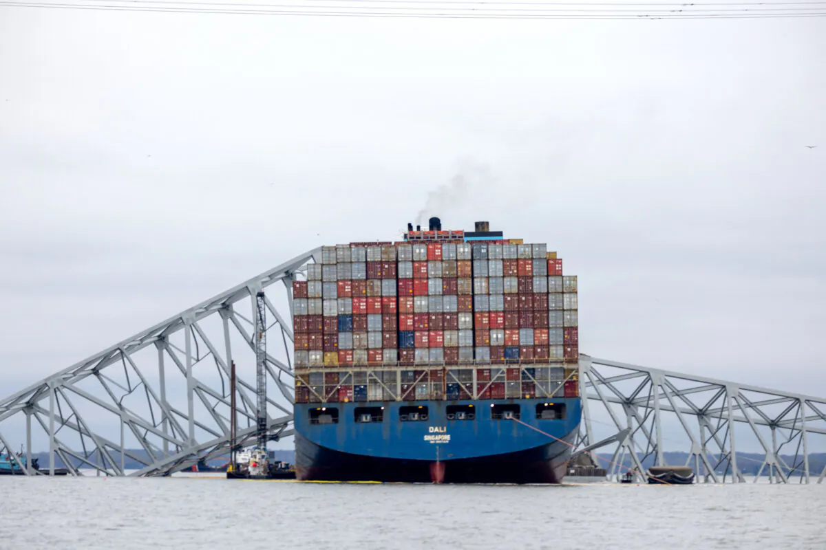 Wreckage from the collapsed Francis Scott Key Bridge rests on the cargo ship Dali at the Port of Baltimore in Maryland, on April 01, 2024. (Tasos Katopodis/Getty Images) 