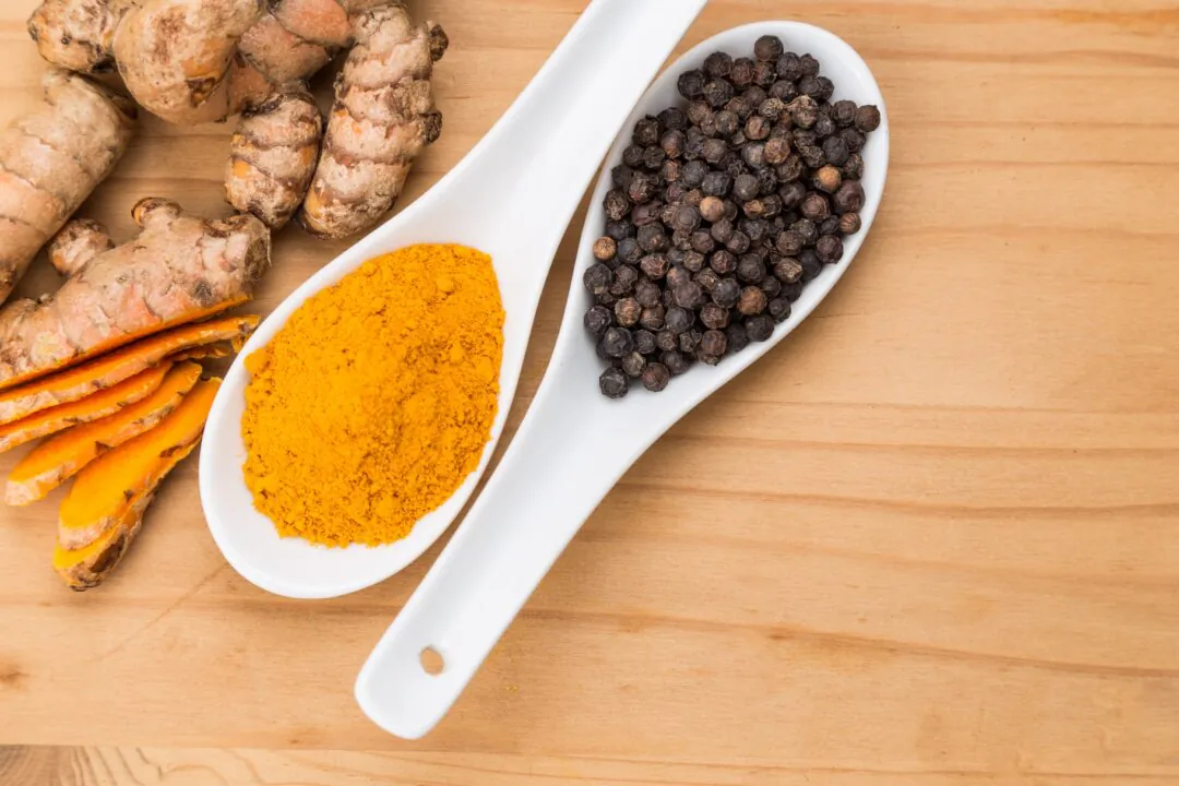 Turmeric root and black pepper combination enhances bioavailability of cucurmin absorption. (ThamKC/Shutterstock)