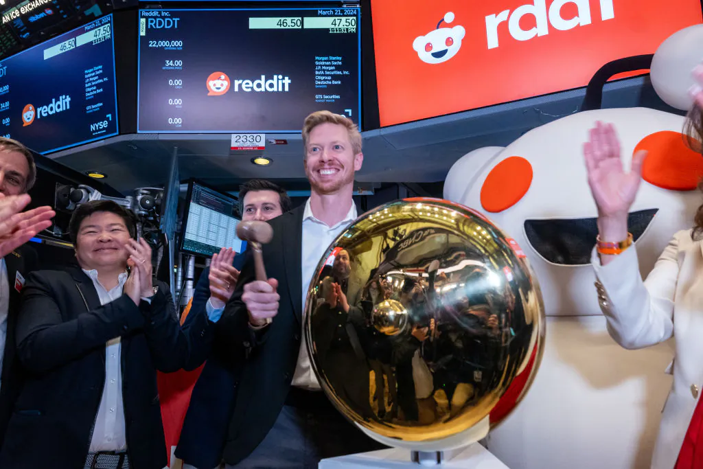Reddit CEO Steve Huffman stands on the floor of the New York Stock Exchange while ringing a bell on the floor setting the share price at $47 in its initial public offering (IPO) in New York on March 21, 2024. (Spencer Platt/Getty Images)