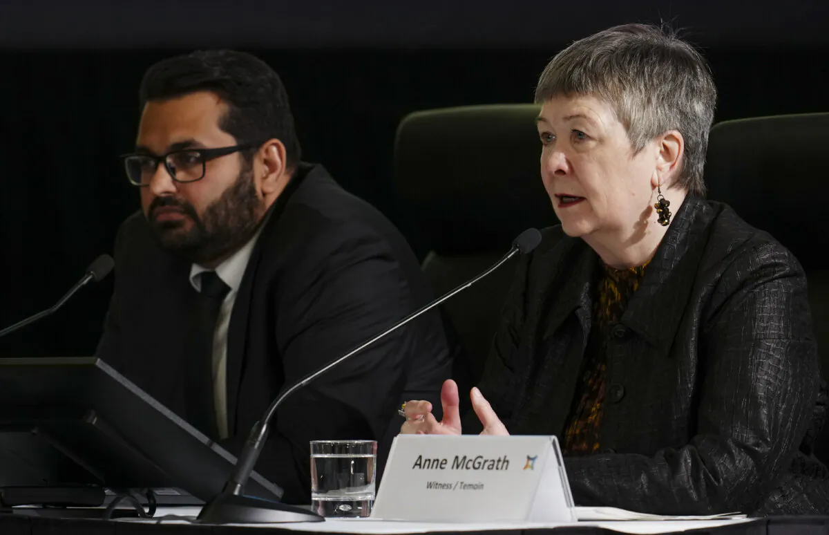 Azam Ishmael (L) and Anne McGrath appear as witnesses at the Public Inquiry Into Foreign Interference in Federal Electoral Processes and Democratic Institutions, in Ottawa on April 2, 2024. (The Canadian Press/Sean Kilpatrick)