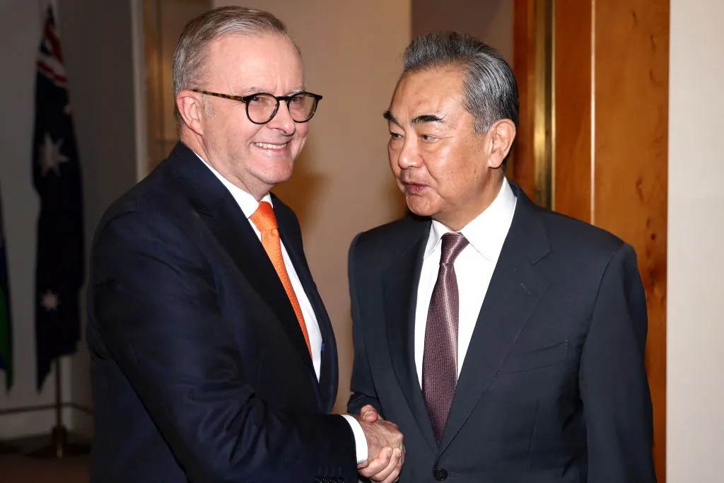 Australian Prime Minister Anthony Albanese (L) receives Chinese Foreign Minister Wang Yi for a meeting in Canberra on March 20, 2024. (David Gray/AFP via Getty Images)