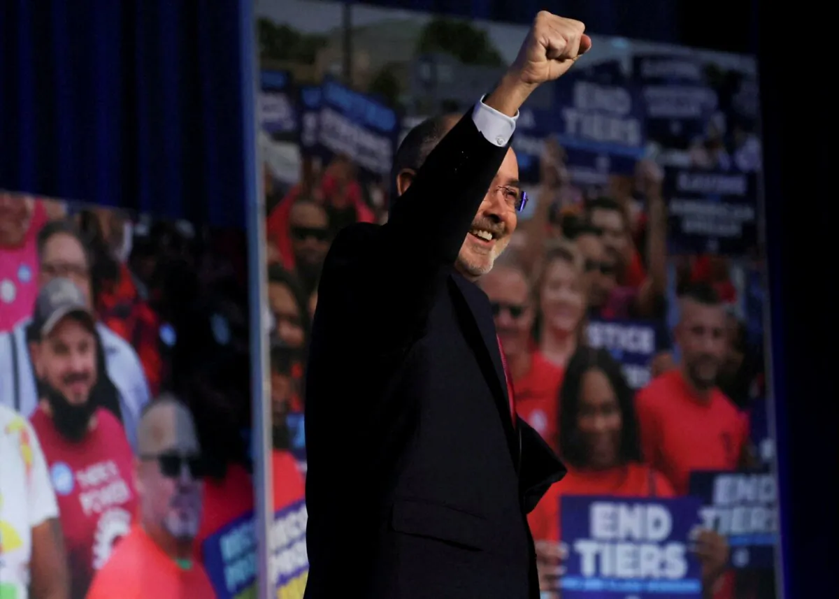 United Auto Workers President Shawn Fain speaks to United Auto Workers members prior to U.S. President Joe Biden's speech at the UAW's Community Action Program legislative conference in Washington on Jan. 24, 2024. (Leah Millis/Reuters)