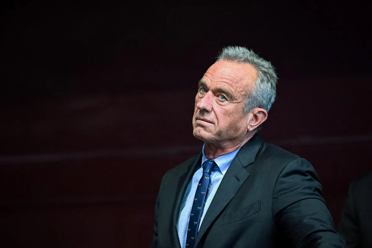 Independent presidential candidate Robert F. Kennedy Jr. watches his running mate Nicole Shanahan speak during a campaign event at the Henry J. Kaiser Event Center in Oakland, Calif., on March 26, 2024. (Josh Edelson/AFP via Getty Images)