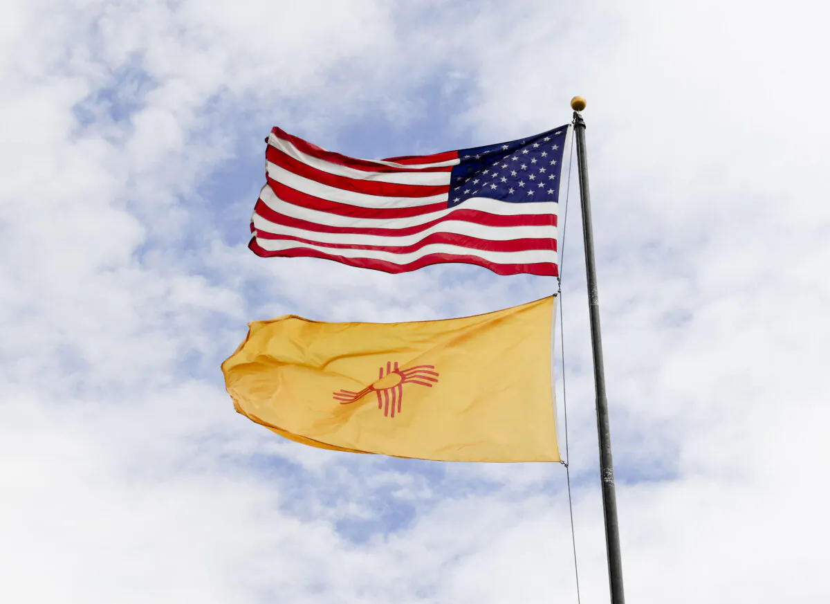 The U.S. and New Mexico flags fly before the upcoming midterm elections in Albuquerque, N.M., on Oct. 1, 2018. (Mark Ralston/AFP via Getty Images)