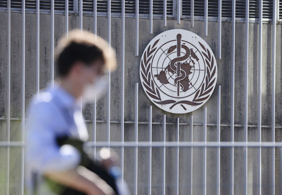 A man enters the headquarters of the World Health Organization in Geneva, Switzerland, on June 15, 2021. (Sean Gallup/Getty Images)
