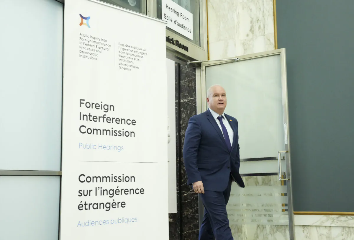 Erin O'Toole leaves after appearing as a witness at the Public Inquiry Into Foreign Interference in Federal Electoral Processes and Democratic Institutions in Ottawa on April 3, 2024. (Sean Kilpatrick/The Canadian Press)