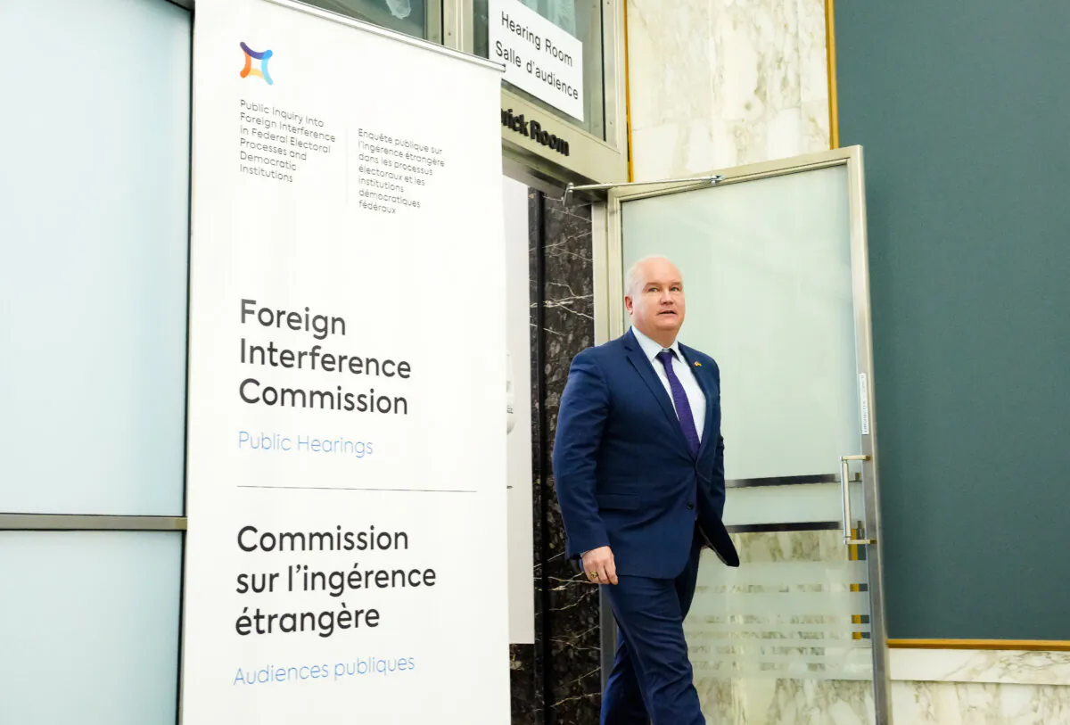Erin O'Toole leaves after appearing as a witness at the Public Inquiry Into Foreign Interference in Federal Electoral Processes and Democratic Institutions in Ottawa on April 3, 2024. (Sean Kilpatrick/The Canadian Press)