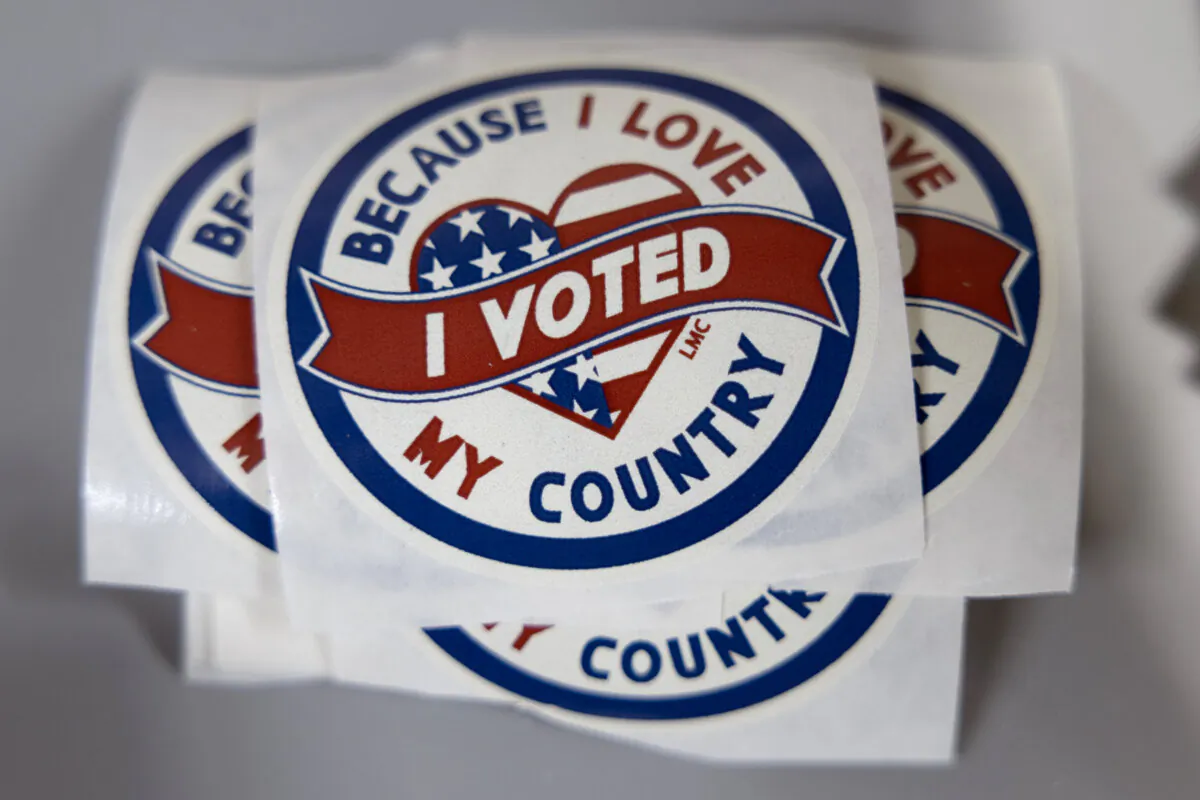 Stickers are passed out to residents who vote in the state's primary election in Green Bay, Wis., on April 2, 2024. (Scott Olson/Getty Images)