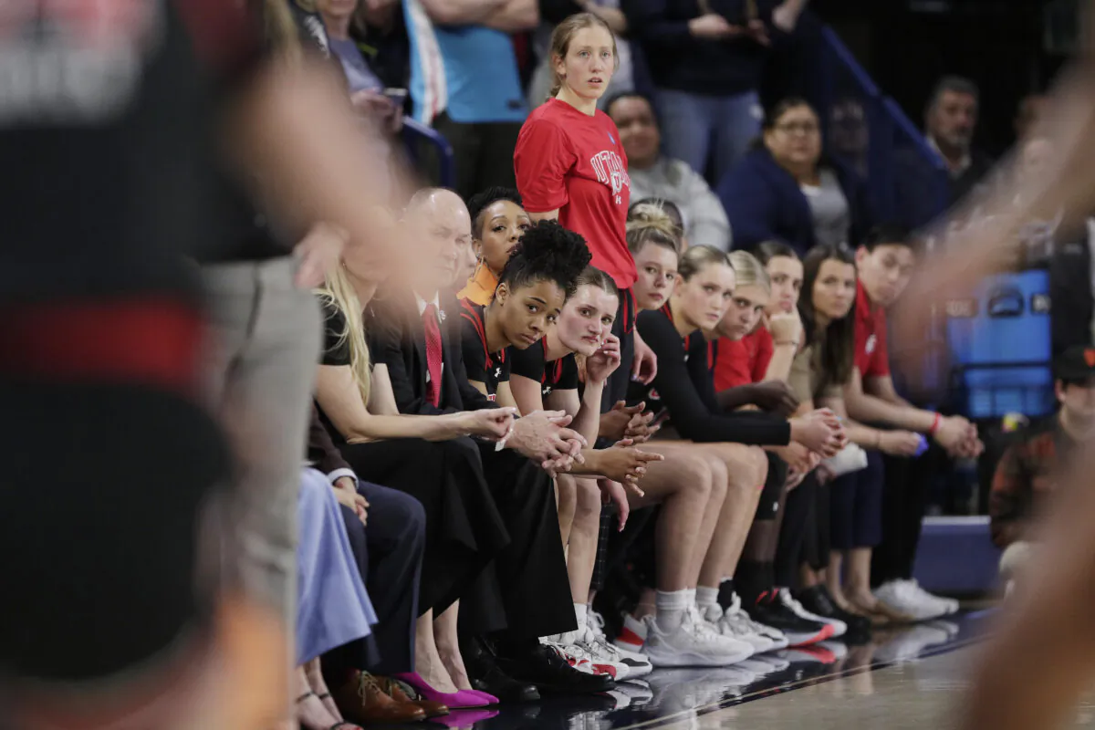 Players and staff on the Utah bench react toward the end of an NCAA women's basketball tournament game against Gonzaga in Spokane, Wash., on March 25, 2024. (Young Kwak/AP Photo)