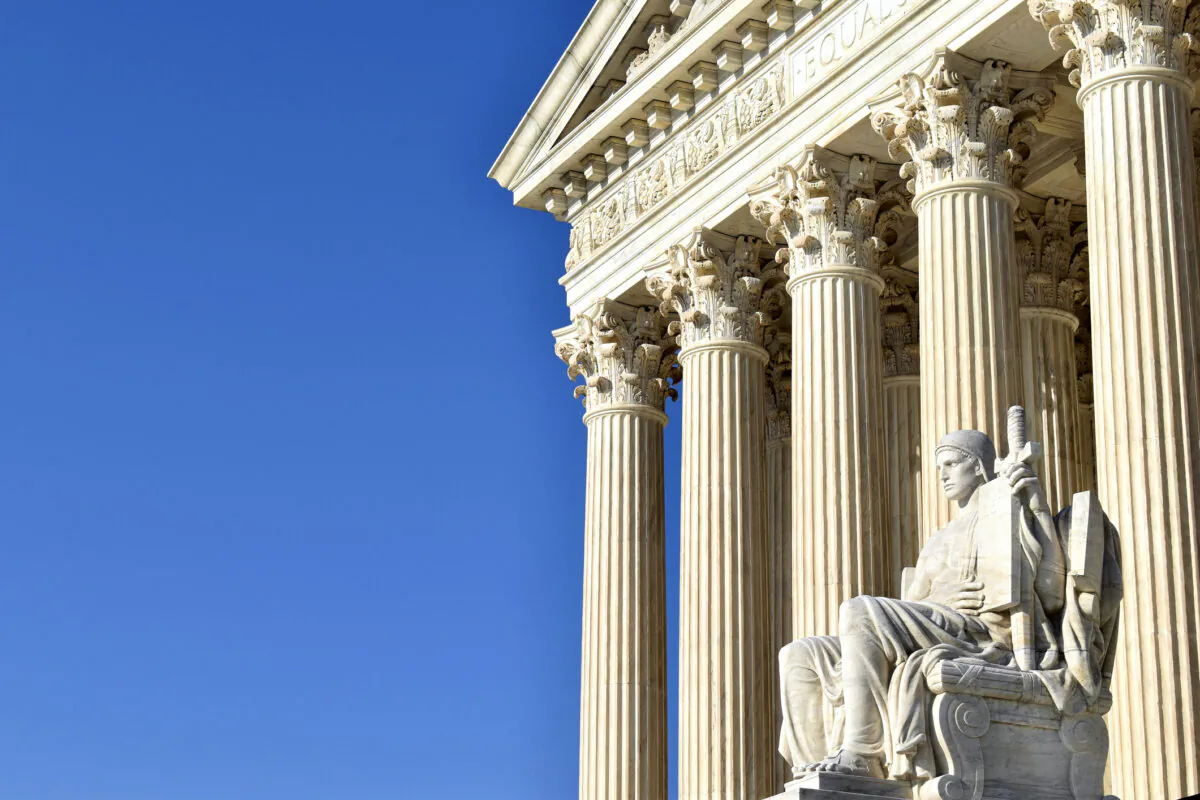 Every element of traditional federal architecture has a purpose: to honor and uplift the nation. Visitors to the U.S. Supreme Court are greeted by a sculpture of the "Guardian or Executor of Law," to the right of the steps. (Perry Spring/Getty Images)