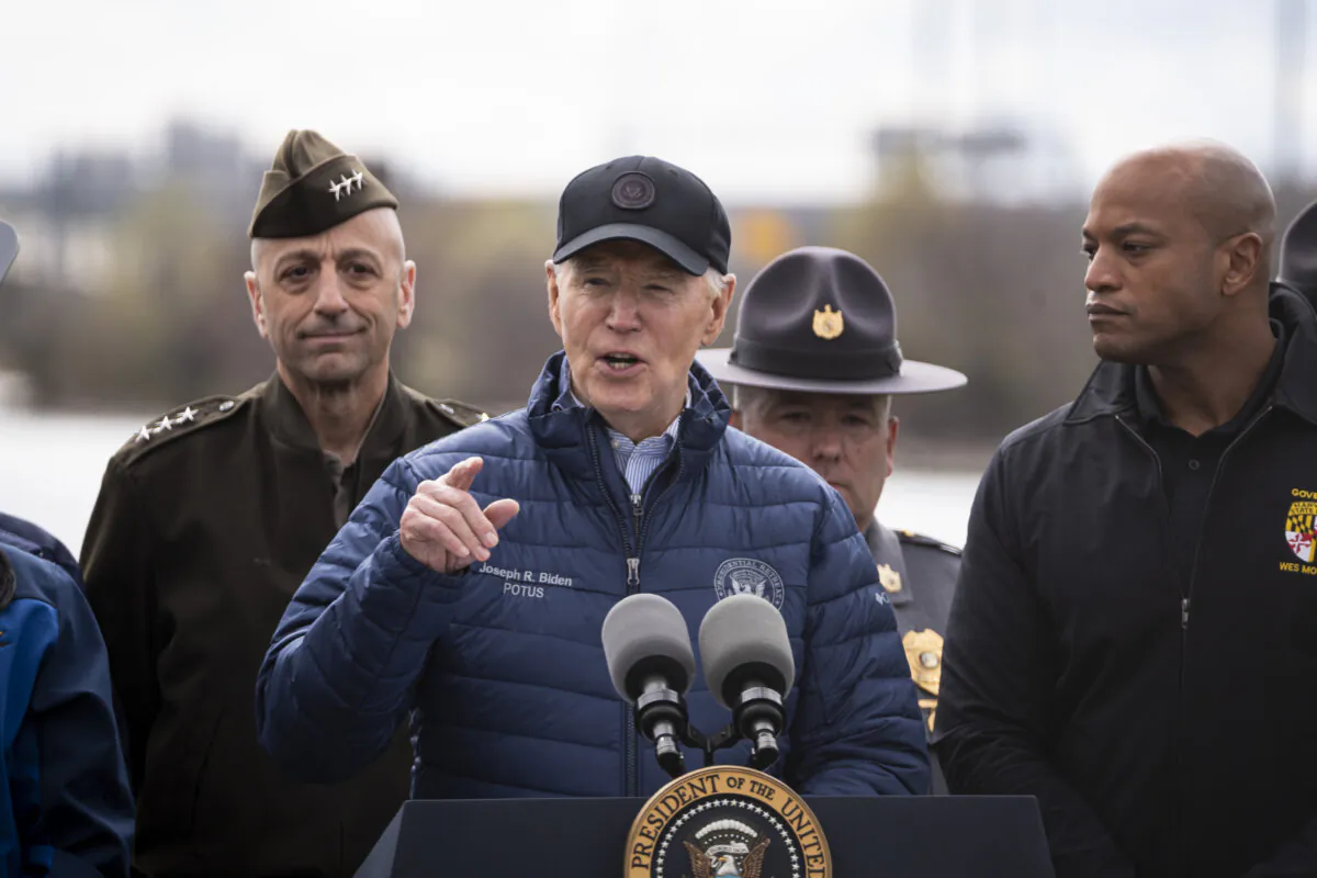 President Joe Biden (C) speaks about the restoration of the Francis Scott Key Bridge at the Maryland Transportation Authority Police headquarters in Baltimore on April 5, 2024. (Madalina Vasiliu/The Epoch Times)