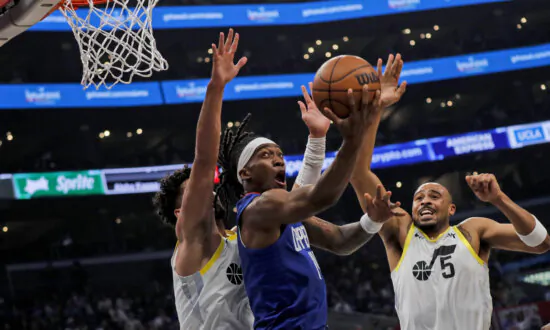 Mann Leads 8 Clippers in Double Figures in 131–102 Rout of Jazz