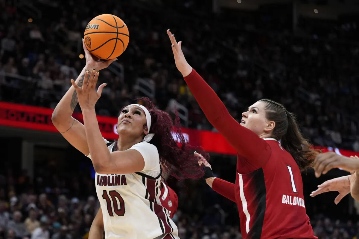 South Carolina center Kamilla Cardoso (10) shoots over North Carolina State center River Baldwin (1) during the first half of a Final Four college basketball game in the women's NCAA Tournament in Cleveland on April 5, 2024. (Morry Gash/AP Photo)