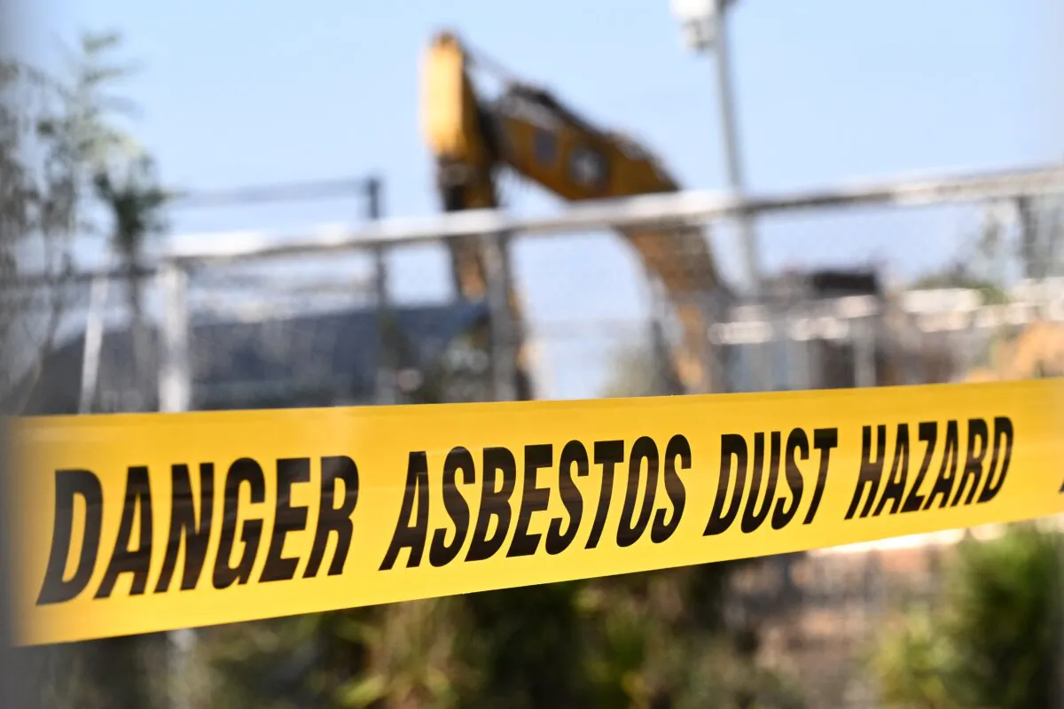 Fencing and warning tape seen around playground equipment at a park where asbestos has been found at Hosken Reserve in Coburg North, Melbourne, Australia, on April 5, 2024. (AAP Image/Joel Carrett) 