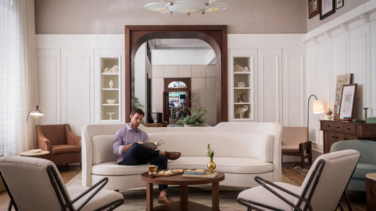 A guest relaxes in a lounge off the lobby at the Perry Lane Hotel in the historic district of Savannah, Georgia. The property, which opened in 2018, redefined luxury accommodations in the city. (Perry Lane Hotel/TNS)