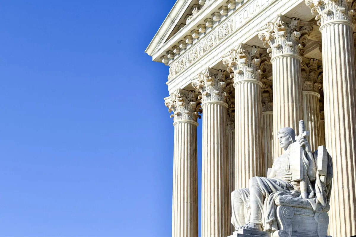A sculpture called 'Authority of Law' in front of the U.S. Supreme Court building in this undated photograph. (Perry Spring/iStock/Getty Images Plus)