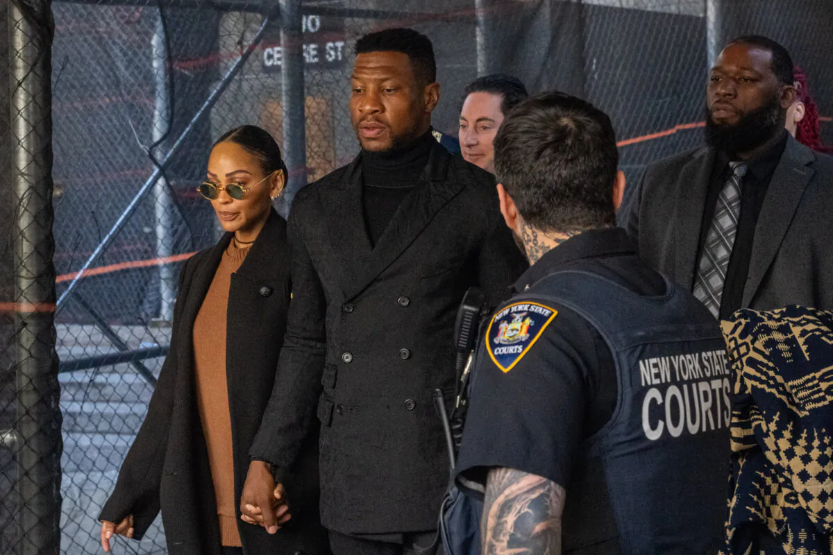 Actor Jonathan Majors departs with girlfriend Meagan Good from his sentencing hearing in the domestic abuse case at Manhattan Criminal Court in New York City on April 8, 2024. (David Dee Delgado/Getty Images)