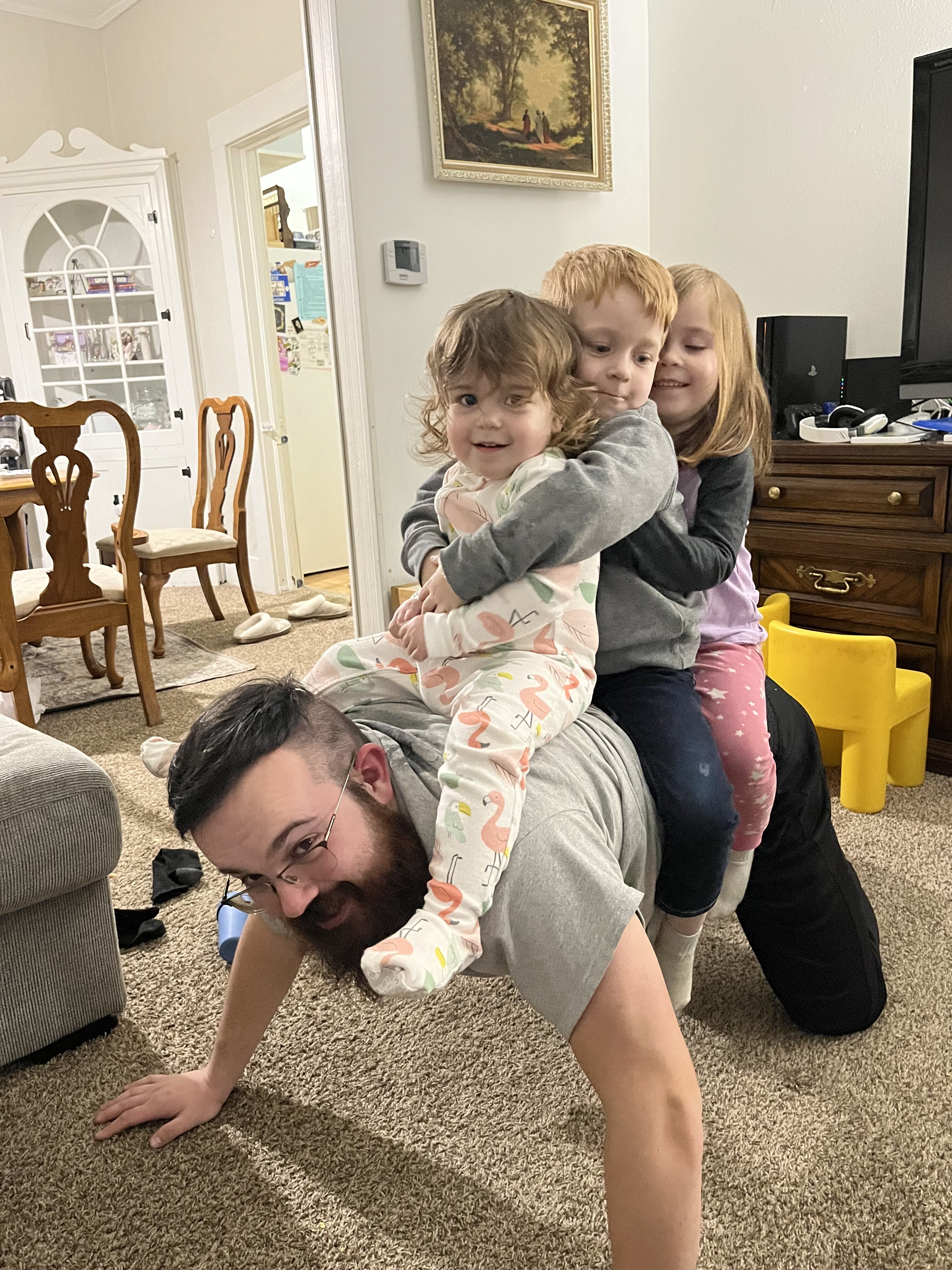 Mr. Farrell with his three kids.