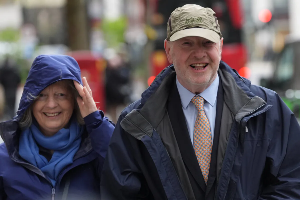 Former subpostmaster and lead campaigner Alan Bates (R) and his wife Suzanne Sercombe (L) arrives to give evidence to the Post Office Horizon IT inquiry at Aldwych House, central London, on April 6, 2024. (Stefan Rousseau/PA Wire)