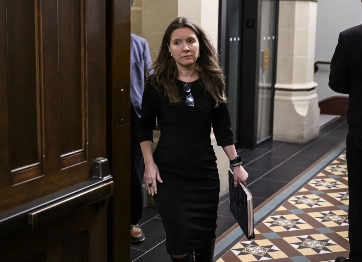 Katie Telford, chief of staff to Prime Minister Justin Trudeau, arrives for a meeting of the Liberal Caucus on Parliament Hill in Ottawa, on Feb. 14, 2024. (The Canadian Press/Justin Tang)